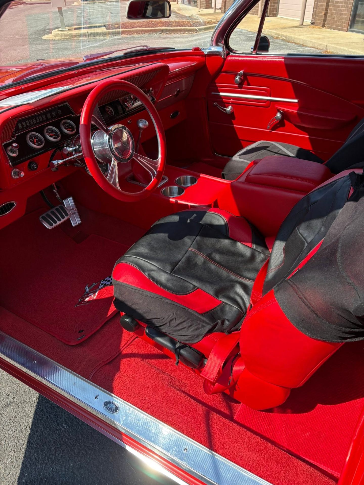Red 1962 Chevrolet Impala hand-washed and finished by Kleen Ride in Waldorf